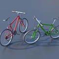 Red and Green Mountain Bicycles Parked Side by Side on Gray Background