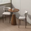 Accent Chairs With Round Wooden Table And White Mug By Window Blinds On Wooden Floor