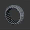 Futuristic Tire Design With Geometric Block Pattern And Silver Metallic Finish