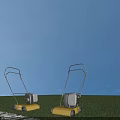 Industrial Garden Lawn Mower Equipment Two Yellow Units on Grass Surface