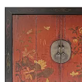 Traditional Oriental Cabinet With Red Lacquer Surface Gold Floral Patterns Black Frame And Decorative Base