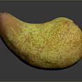 Fresh Ripe Mango With Yellow Orange Speckled Skin Curved Shape on Dark Surface with Reflection