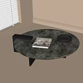 Round Grey Marble Coffee Table With Black Legs And Decorative Items 3d model