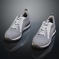 Pair of Gray Sneakers with White Laces and Modern Rubber Sole Casual Style