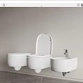 Sleek White Wall Mounted Toilet And Sink In Light Wall Dark Floor Bathroom