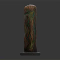 Artistic Sculptural Column with Intricate Wavy Texture Green and Brown Patterns on Square Base