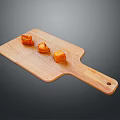 Three Orange Food Chunks Arranged On Wooden Cutting Board Surface