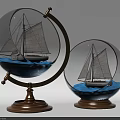 Decorative Ornament Set With Transparent Glass Spheres Sailboat Models Blue Bases And Golden Wooden Stand