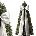 Decorative Christmas Tree With Large White Bow And Green Festive Branches 3d model
