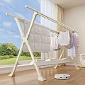 White Foldable Drying Rack with Quilt and Clothes in Indoor by Window with Green View