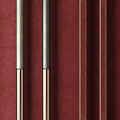 Door Handles of Various Materials and Different Colors Arranged on Red Background