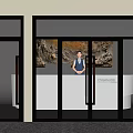 Modern Glass Double Doors Entrance With Metal Frames And Textured Flooring