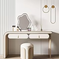 Modern Dressing Table With Irregular Mirror Cosmetic Bottles Gold Accents And Round Upholstered Stool