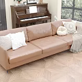 Brown Three Seater Leather Sofa With Pillows Throw Blanket And Window View Of Green Plants
