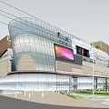 Modern Commercial Complex Featuring Glass Facade Multi Level Retail And Landscaped Plaza