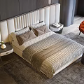 Modern Double Bed With Beige Padded Headboard Textured Gray Bedspread And Orange Armchair In Bedroom