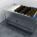 Stainless Steel Open Display Counter With Black And White Containers On White Tiled Wall