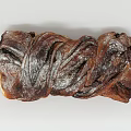 Freshly Baked Soft Rich Brown Sweet Twisted Bread Dusted With Powdered Sugar
