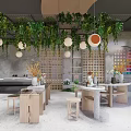 Modern Cafe Interior With Hanging Green Plants Round Pendant Lights Wooden Tables And Colorful Decor