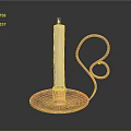 Decorative Copper Candlestick Holder With Curved Design And Lit White Candle
