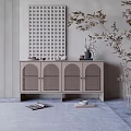 Elegant Decorative Ornament Set On Rattan Cabinet With Geometric Painting Dried Branches And Books