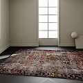 Stylish Rug With Vibrant Colorful Pattern In Modern Room With Large Window And Dark Flooring
