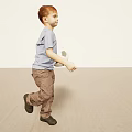 Young Boy Walking With Soccer Ball In Casual Outfit