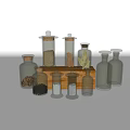Various Shapes And Sizes Ceramic Vessels With Lids Filled With Spices Herbs And Cinnamon Sticks