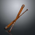 Decorative Wooden Staffs Featuring Carved Design Striped Accents And Metal Rings Crossed