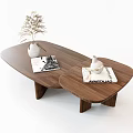 Modern Walnut Oval Coffee Table with White Vase Magazines and Decorative Plant