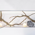 Natural Stone and Wood Branches Decorative Display with Round Lights on White Shelf