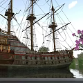 Ancient Sailing Ship In Waterfront Garden Landscape With Purple Flowers And Green Plants