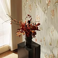 Black Vase With Orange Red Flowers On Pedestal Table Against Floral Striped Wallpaper