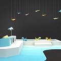 Colorful Paper Planes Hanging Over White Blue Platforms With Small Umbrella And Chairs
