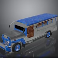 Vintage Blue And Silver Toy Bus With Retro Design And Brown Seats