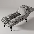 Gray Modern Lounge Chair With Pleated Design and Soft Gray Cushion on Black Metal Legs