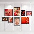 Red Theme Photo Wall With Traditional Chinese Decorations And Framed Pictures On White Marble