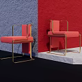 Modern Red Upholstered Dining Chairs With Gold Frame Against Blue And Red Walls