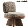 Modern Upholstered Single Chair With Patterned Fabric And Wooden Cone Legs
