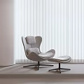 White Vertical Blinds in Modern Room with Grey Armchair and Natural Light
