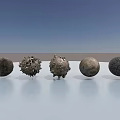 Five Various Textured Spherical Sculptures With Artistic Surface Patterns