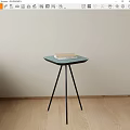 Stylish Green Hexagonal Side Table With Black Tripod Legs And Book On Top 3d model