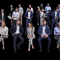 Diverse Team of Business Professionals in Formal Attire Posing Together