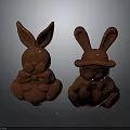 Two Red Rabbit Figurines One With Hat And Bow Ties 3d model