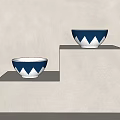 Navy Blue And White Tableware Set With Triangular Pattern Bowls Displayed On White Pedestals 3d model