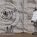 Abstract Floor Lamps with Spiral Layered Designs Human Figure Bases Stone Wall Wooden Floor Background