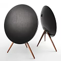 Modern Headphone Speaker with Black Circular Design and Wooden Stand for Home Audio