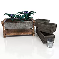 Purple Flowering Plants In Metal Planter On Wooden Stand With Wooden Crates And Metal Bucket