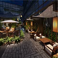 Traditional Chinese Style Garden Landscape With Cozy Lounge Seats Lush Green Plants And Warm Lighting