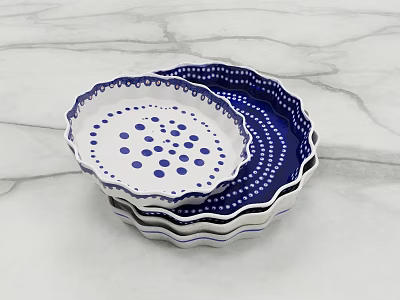 Ceramic Dish Set with Blue White Polka Dot and Ruffled Edge Stacked on Marble Surface 3d model